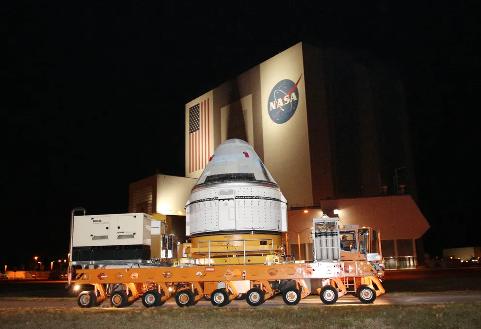 A Boeing CST-100 Starliner spacecraft is rolled out from Boeing's Commercial Cargo and Processing Facility at the Kennedy Space Center in Cape Canaveral, Florida on April 16, 2024 | Source: Getty Images